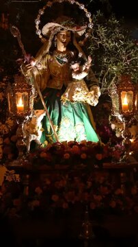 Fiesta de los Rondeles in the village of Casarabonela. A traditional virgen parade with men carrying fire torches