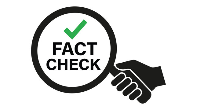 Hand holding a magnifying glass inspecting the bold text fact check with a green tick