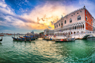 Fototapeta premium Amazing landscape of Riva degli Schiavoni with parked gondolas in Venice.