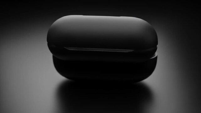 Sleek Black Wireless Earbuds in Charging Case with Blue LED Light.