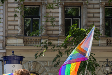 rainbow pride flag on a city street © Sarolta Nagy