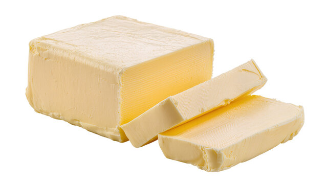 Isolated block of fresh yellow butter with slices cut off, ready for cooking and baking ingredients