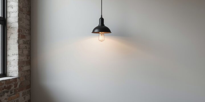Industrial vintage lamp design on a flat white wall inside a loft