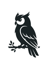 Fototapeta premium Silhouette of a Wise Owl Perched on a Branch.