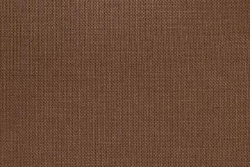 Fototapeta premium Dark brown linen fabric cloth texture for background, natural textile pattern.