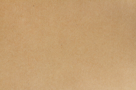 Cardboard sheet texture background, pattern of brown kraft paper with vintage style.