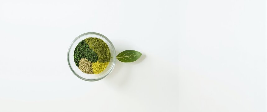 Wholesome detox superfood blend of barley chlorella and spirulina with white surface