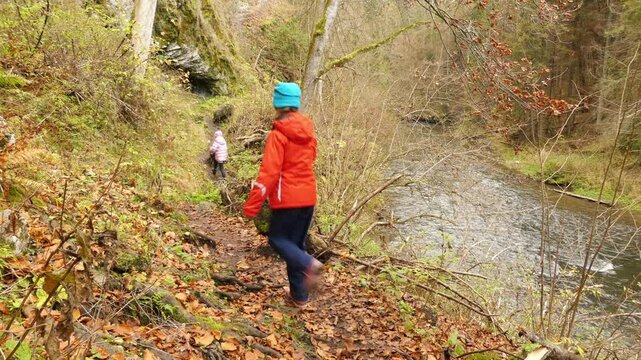 Two little beautiful girls walk in Slovak Paradise. Slovak Paradise (Slovensky raj) is mountain range in eastern Slovakia, part of Spis-Gemer Karst, located between towns of Spisska Nova Ves.