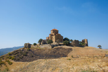 Fototapeta premium Panoramic photo of Georgia old monastery. Orthodox church in mountain