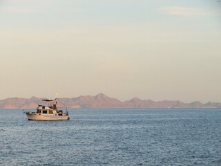 Obraz premium sailboat at sunset at sea in Baja California Sur, Mexico