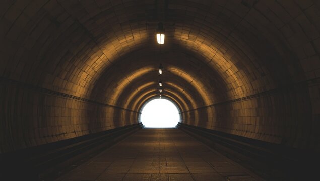 Tunnel leading to bright light at the end