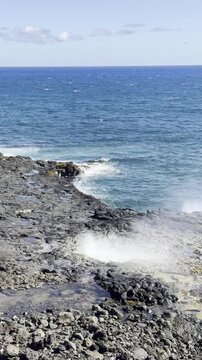 21 October 2024, USA, Hawaii, The Garden Isle, Kauaʻi, Koloa, Lawai Road, Spouting Horn Park - Iconic Blowhole Attraction Along the South Shore