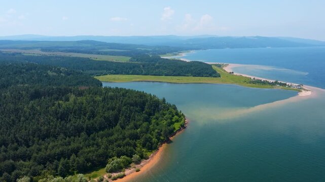 Shiroka Polyana reservoir aerial view Rhodope mountains Bulgaria pine tree forest lake drone shot scenic summer landscape water reserve tourism background