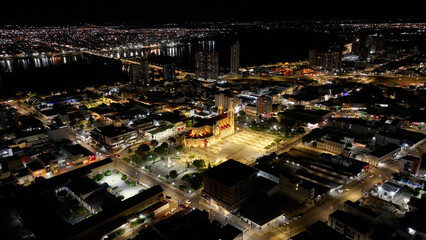 Obraz premium Night Dom Malan Square At Petrolina In Pernambuco Brazil. Sagrado Coracao De Jesus Cathedral. Illuminated Church. Downtown District. Dom Malan Square At Petrolina In Pernambuco. City At Night Skyline.