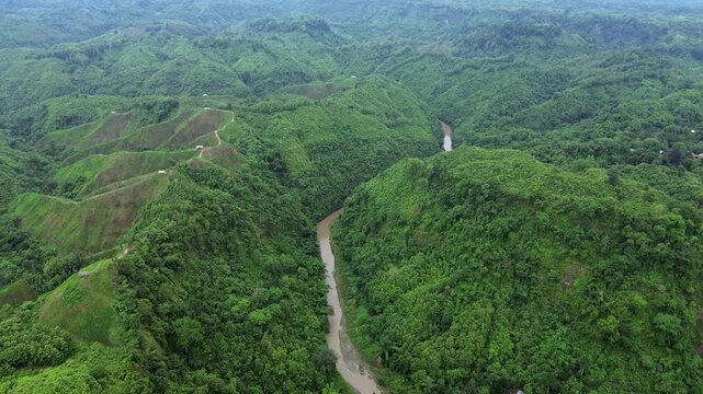 Aerial View of Matamuhuri River Flowing Through Green Hills in Bangladesh