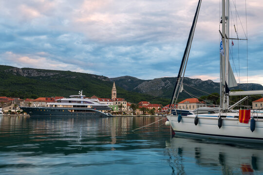 Luxury yachts and sailboats moored in Jelsa harbor, Hvar island