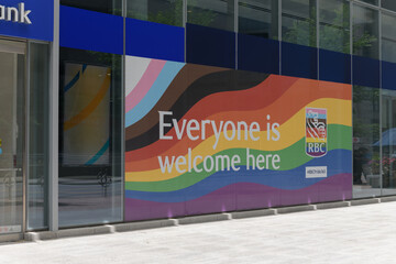 Obraz premium exterior glass curtain wall with Pride flag at RBC Water Park Place, 88 Queens Quay W, Toronto