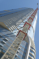 Obraz premium oblique angle view up of the SkyTower nearing completion at Pinnacle International, 1 Yonge St, Toronto
