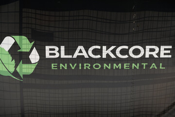 Obraz premium close-up of banner (Blackcore Environmental, a prominent Toronto-based demolition, excavation, and environmental services company)