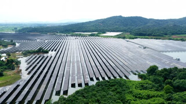Aerial view of fishery-solar complementary photovoltaic power station on water