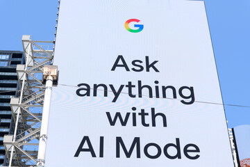 Obraz premium bright white Google billboard lights up Sankofa Square in Toronto, pushing the slogan 