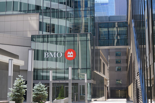 BMO Financial Group and corporate logo sign outside entrance to BMO Place at CF Toronto Eaton Centre located at 33 Dundas St W