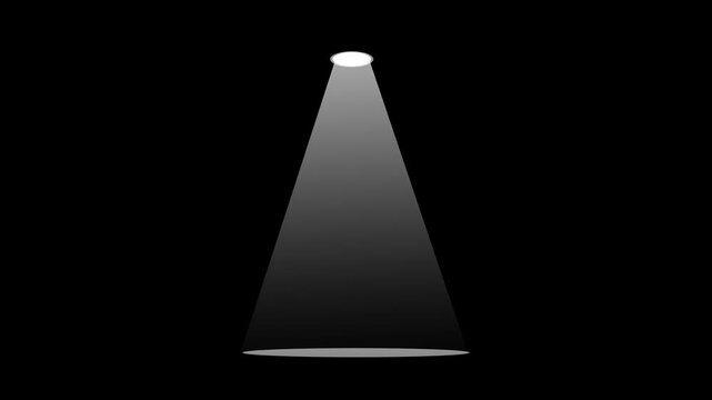 A single overhead spotlight projects a bright white cone of light downward onto an empty floor against a solid black background.