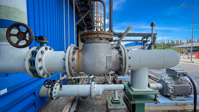 A check valve installed on a chemical or fluid pipeline prevents backflow, ensuring safety,