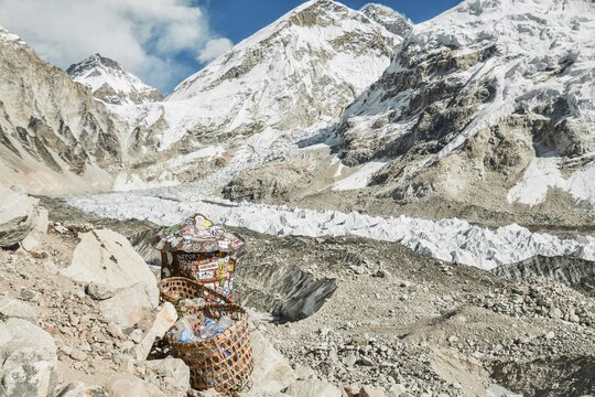 Sagarmatha national park, Nepal - 22nd november, 2023: Plastic bottles garbage waste in baskets collection point on everest base camp trek in Himalayas mountains.EBC Khumbu icefall