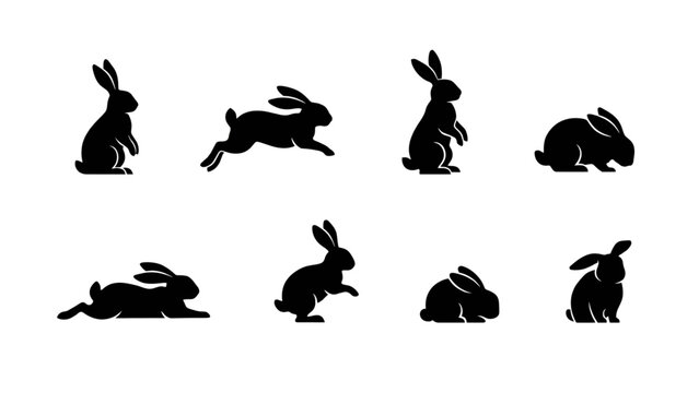Set of playful black silhouette rabbits in various dynamic poses Vector