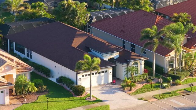 Aerial view of expensive residential houses in small town in southwest Florida. American dream homes as example of real estate development in US suburbs.