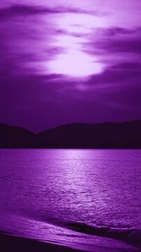 Surreal pop art vibrant purple sunset sky over sparkling sea