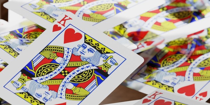 king of hearts playing cards in a pile