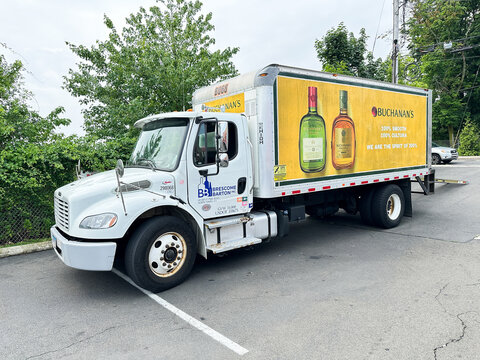 NORWALK, CT, USA - JUNE 26, 2026: Brescome barton distribution truck parked in norwalk, connecticut delivering alcoholic beverages