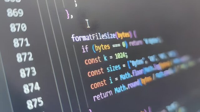 Close up of javascript source code scrolling on a computer screen
