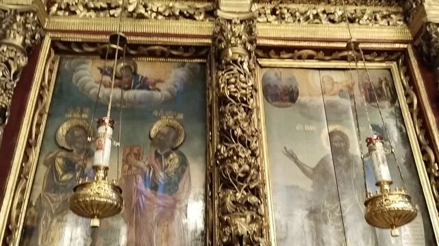 historic baroque iconostasis inside of Holy Trinity Cathedral in Pskov Kremlin, Russia. Altar screen. Orthodox Christian Iconostasis. ancient religious icons. cultural heritage footage