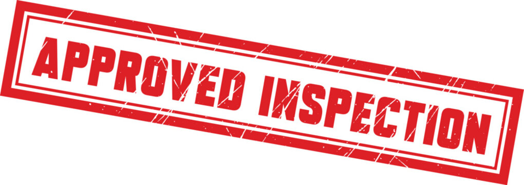 APPROVED INSPECTION: A classic red rectangular rubber stamp used to finalize safety audits and quality assessment tests