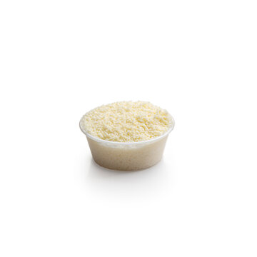 Studio Shot of Grated Parmesan Cheese in Clear Plastic Container on White Background