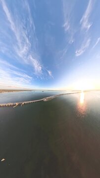 Vertical Drone Video of Sunset Over Dunedin Causeway and Saint Joseph Sound, Florida