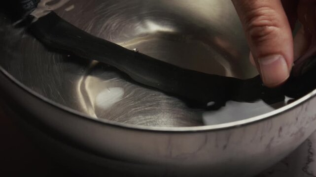 Testing Flat Inner Tube in Water bucket for Air Bubbles