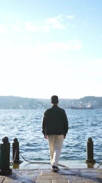 Traveler Admiring Scenic Bosphorus View in Istanbul Turkey