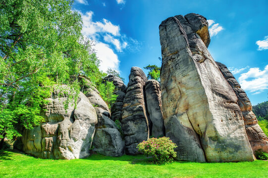 Adrspach-Teplice Rock Town and green lawn in Czech Republic. Beautiful huge rocks formations in natural parkland
