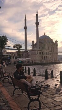 Young Traveler Enjoying Bosphorus Waterfront in Ortakoy Istanbul