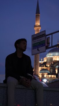Travel Lifestyle Portrait with Illuminated Mosque in Istanbul