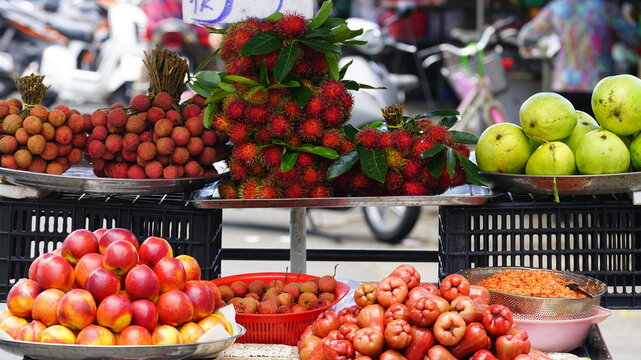 Peaches, rambutan, and wax apples sold at the fruit store