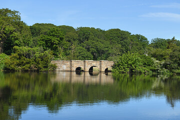 Frank Melville Park, 24-acre sanctuary that beautifully intertwines history, nature, and community. Stone Bridge. Setauket, New York, United States © Andrei Romanov