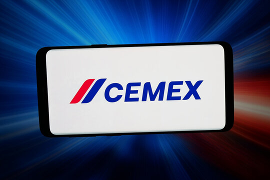 Stuttgart, Germany - 06-22-2026: In this photo illustration, the logo of Mexican building materials company Cemex is displayed on a smartphone in front of abstract background on computer screen.