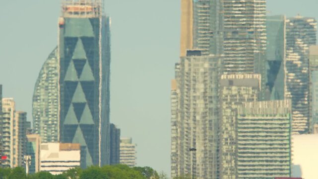 North American city under an extreme heat event, temperatures above 40&deg;C with visible air distortion. A heat dome traps hot air, triggering widespread heat advisories, warnings, and watches.