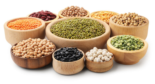 Different types of legumes in bowls isolated on white