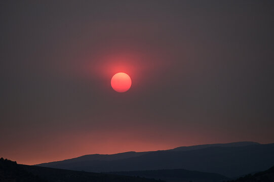 Wildfire enhanced sunset and cloudscape over Grass Valley in western Colorado on June 28, 2026.